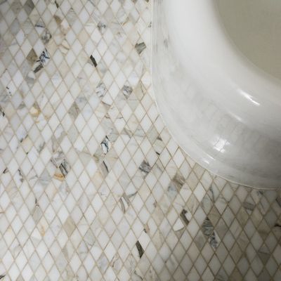 i_Calacatta_Gold_LWarrenBathroom_6_1000x.jpg