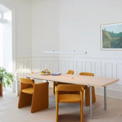 GetImage.ashx?image=%2fFiles%2fImages%2fPWTBS_SIROCCO+chair_Barnum+5+Ocher_TUBBY+TUBE+linear+pendant_aluminium_TUBBY+TUBE+table_douglas+pine.jpg&width=640&format=webp