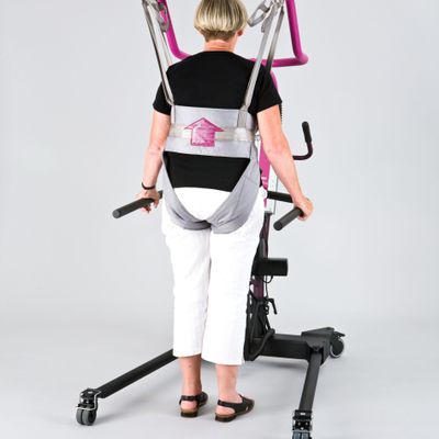 Walking-trainer-w.-patient-from-behind-scaled.jpg