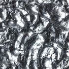 Irregular surface lined with silver coloured leaf