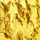 Flying gold coloured leaf