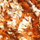Irregular surface lined with copper coloured leaf