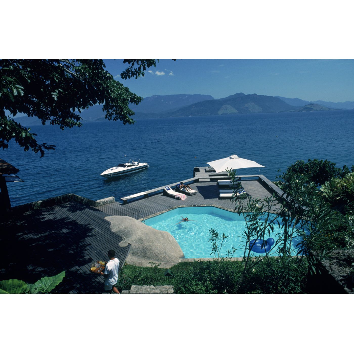 Slim Aarons "Pool By The Sea" Photograph by Jonathan Adler