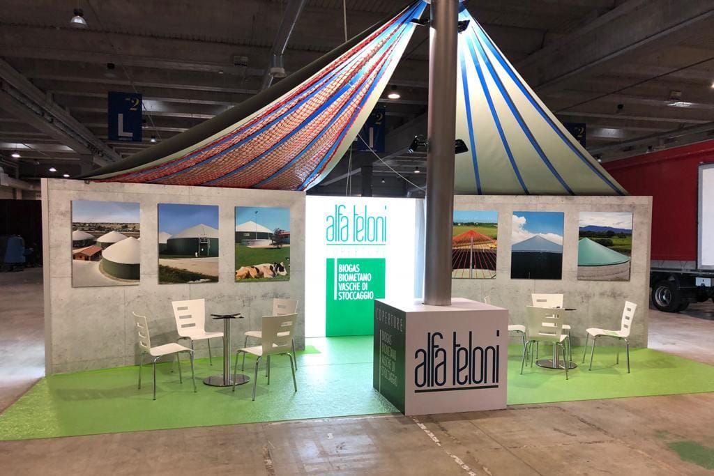 STAND FIERISTICO E RESTYLING DEL LOGO PER ALFA TELONI PUBBLICITA’ - Remor - Espositori pubblicitari, insegne, segnaletica, cartellonistica by Remor