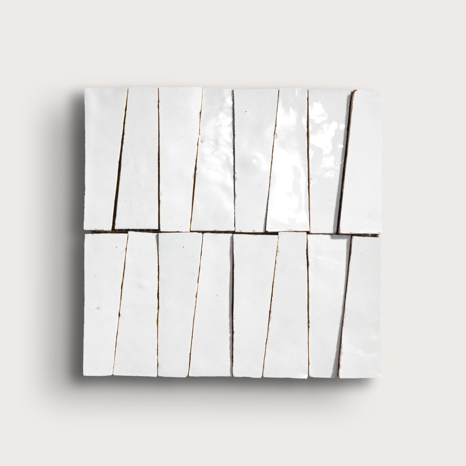 Bright White 1x4 Trapezoid Mosaic Zellige Tile by Riad Tile