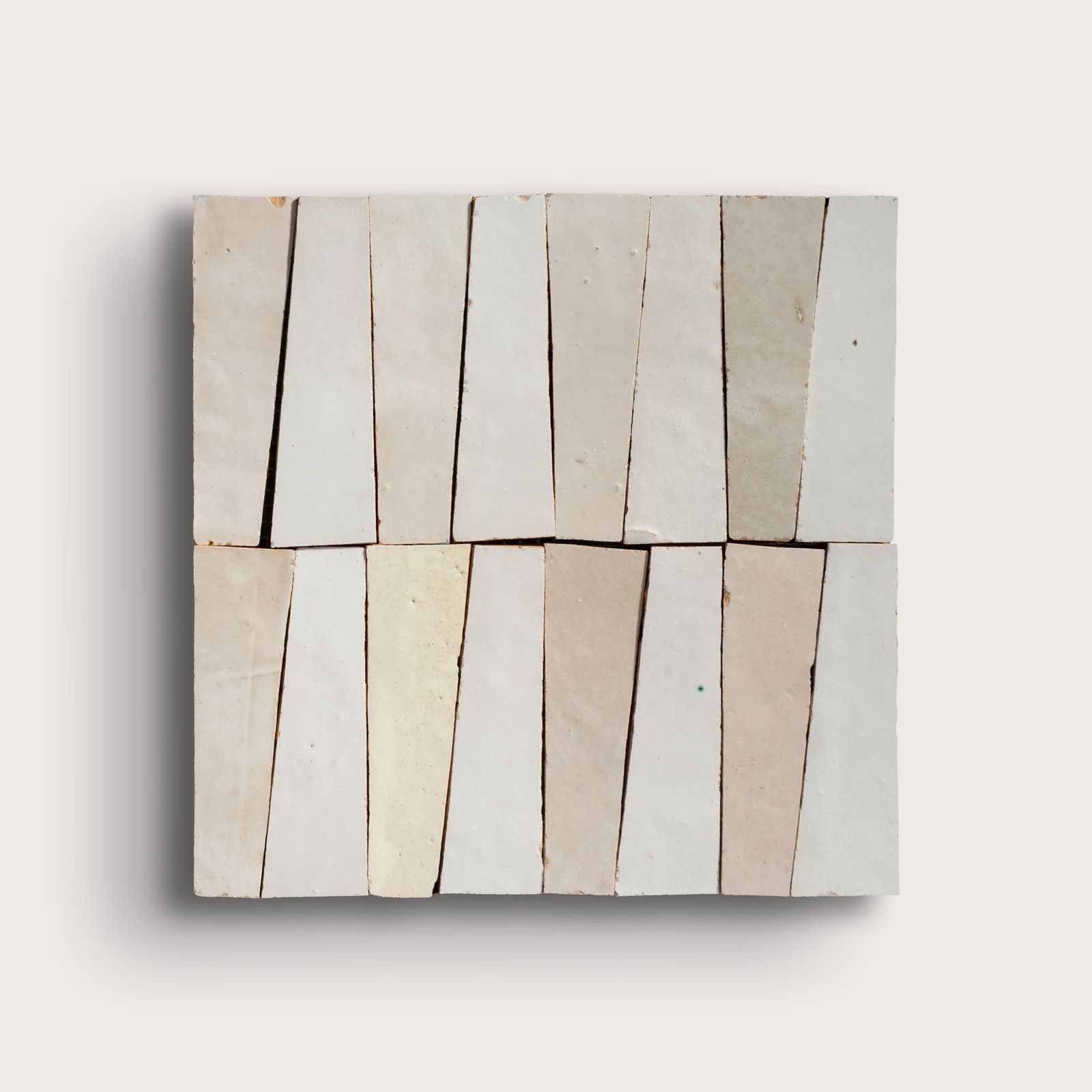 Natural White & Snow White 1x4 Trapezoid Mosaic Zellige Tile by Riad Tile