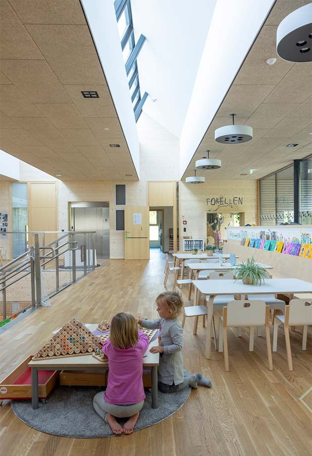 Shed roof | modular skylights and photovoltaic panels by Velux Commercial