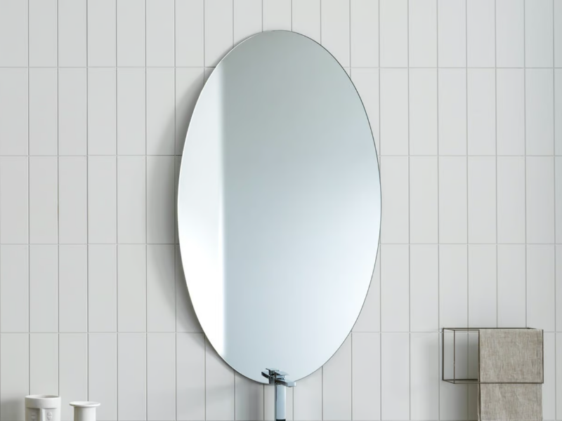 PIEGAMI - Oval wall-mounted mirror by ARTELINEA