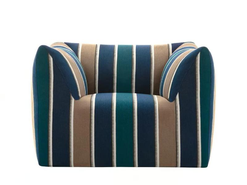 LA BAMBOLA OUTDOOR - Upholstered fabric garden armchair by B&B Italia Outdoor