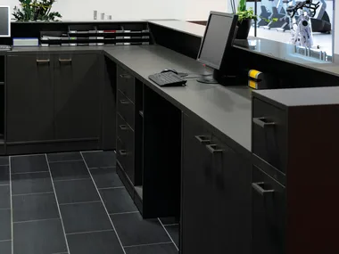 VEMO - Low melamine-faced chipboard office storage unit with hinged doors by FIT INTERIORS