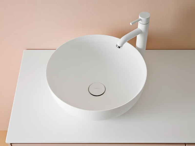 CERCLO - Countertop round Corian® washbasin by INBANI