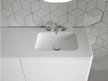 QUADRO 45 - Rectangular Corian® washbasin with integrated countertop by INBANI