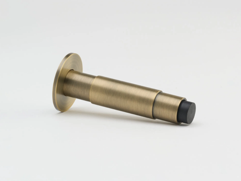LOLA - Brass doorstop by Lo & Co Interiors