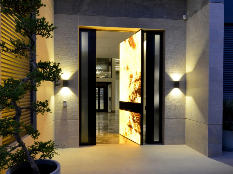 SYNUA - Pivot Backlit Onyx safery door by OIKOS VENEZIA