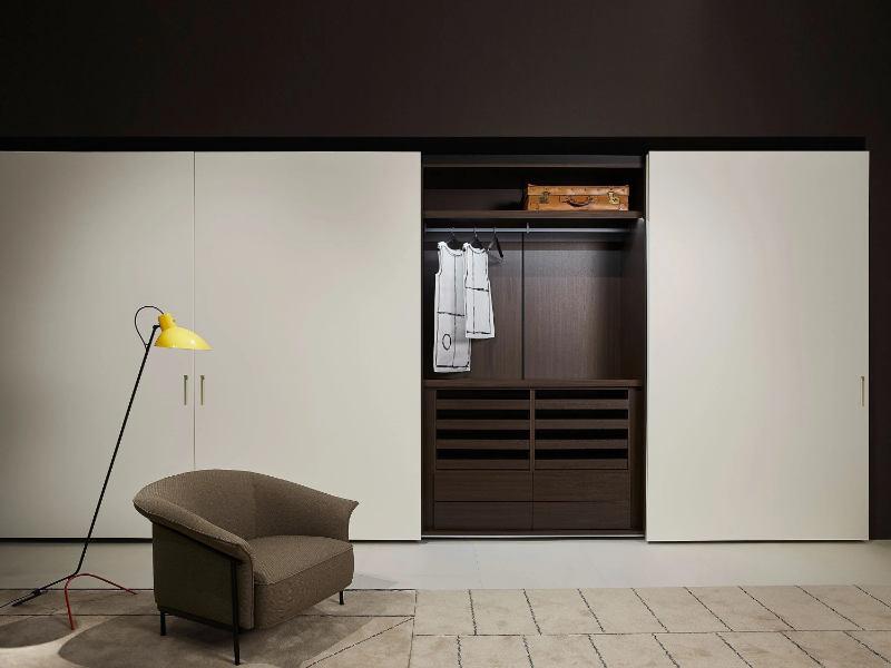 STORAGE PULL-OUT SLIDING - Sectional wardrobe with coplanar doors custom by Porro