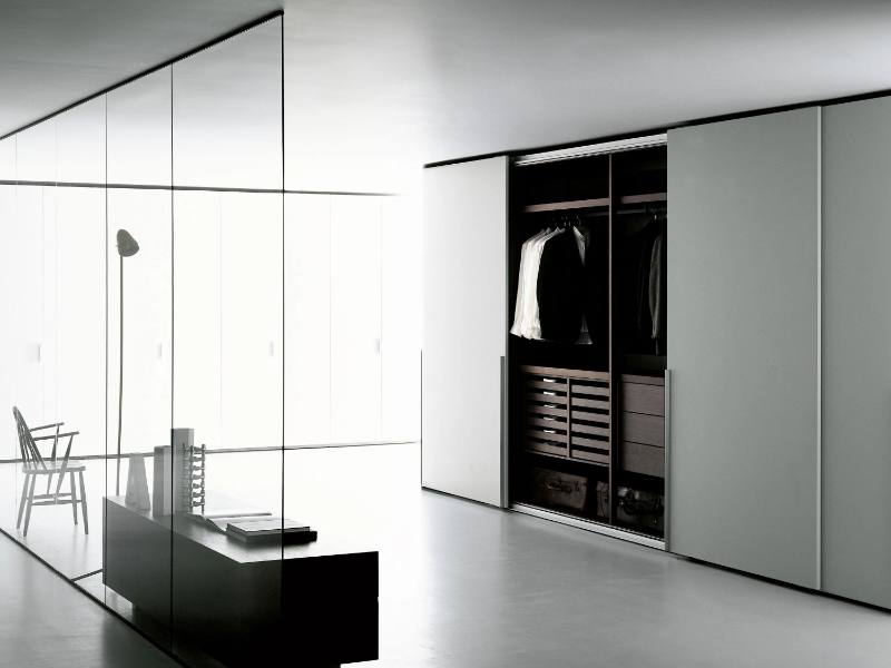 STORAGE SLIDING - Sectional wardrobe with sliding doors custom by Porro
