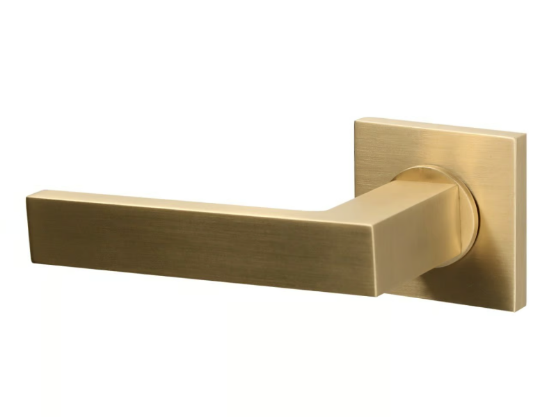 STOCKHOLM - Brass door handle on rose by Quincalux