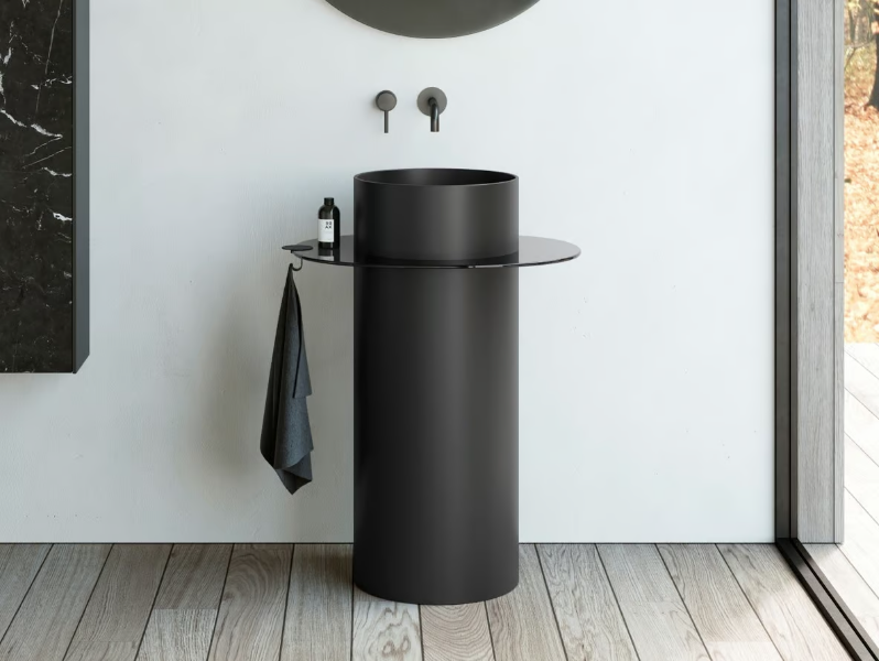 DISCOVOLANTE - Freestanding Corian® washbasin by Rexa