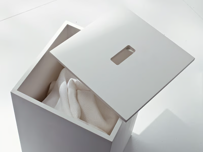 UNICO - Corian® laundry container by Rexa