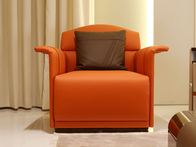 MADISON - Contemporary style upholstered leather armchair with armrests by Turri