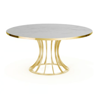 BOOMERANG - Round steel dining table _ Vela Arredamenti
