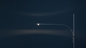 Uau - Floor lamp by Catellani & Smith