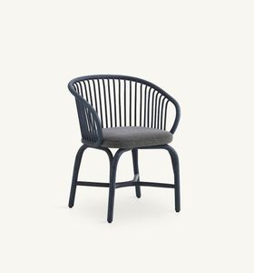 Huma dining armchair with rattan legs