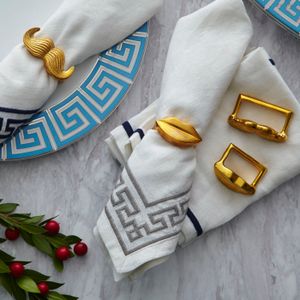 Brass Muse Napkin Rings - Styling by Jonathan Adler
