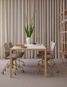 Stella upholstered armchair wheel base, adjustable height - Chair by Swedese