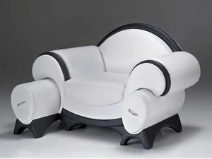 SUPRISMO - Upholstered armchair with footstool with armrests - Armchair by formitalia luxury group