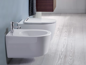 ONE - Wall-hung ceramic bidet - Toilet seat by Geberit