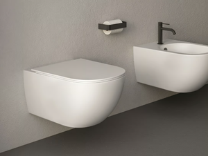 PIN - Wall-hung ceramic toilet - Toilet seat by Nic