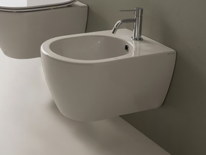 MOON - Wall-hung ceramic bidet - Toilet seat by Scarabeo Ceramiche