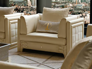 NUMERO TRE - Upholstered leather armchair with armrests - Armchair by Turri