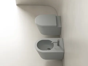 IL - Wall-hung rimless ceramic toilet - Toilet seat by Valdama