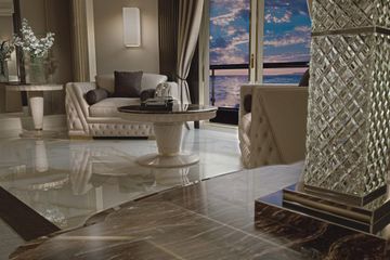 Coffee tables with marble top and embroidered leather elements by Zanaboni - view 3
