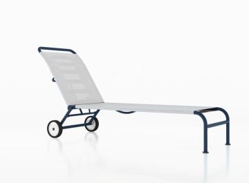 Green sun lounger by Alias