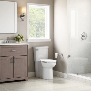 Clean 1.28 GPF Left Trip Lever Chair Height Elongated-Front 12-in. Rough-In Toilet with Seat by American Standard - view 7