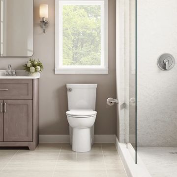 Clean 1.28 GPF Left Trip Lever Chair Height Elongated-Front 12-in. Rough-In Toilet with Seat by American Standard - view 8