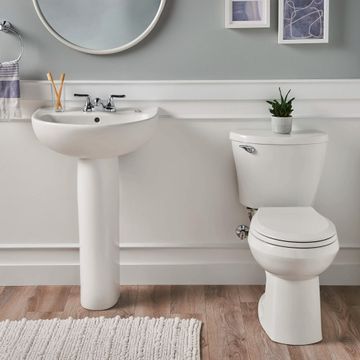 Mainstream Two-Piece 1.28 gpf/4.8 Lpf Chair Height Round Front Toilet with Seat by American Standard - view 6