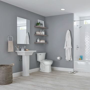 Edgemere Two-Piece 1.28 gpf/4.8 Lpf Chair Height Round Front 10-Inch Rough Toilet with Seat by American Standard - view 7