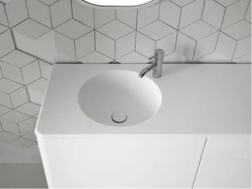 CERCLO - Round single Corian® washbasin with integrated countertop by INBANI - view 2