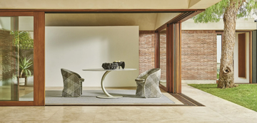 FLEXION - Round steel garden table by Varaschin - view 3