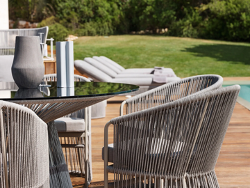 TIBIDABO - Round table with synthetic fiber weaving and glass top by Varaschin - view 3