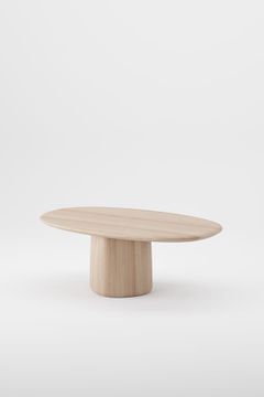 Column oval coffee table by Artisan