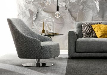 Emilia custom made swivel armchair with steel base by BertO