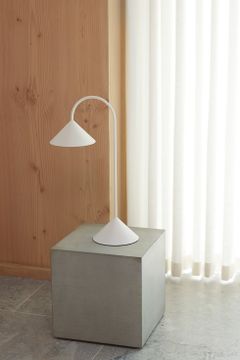 Grasp  Portable Table Lamp by Frandsen