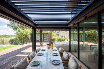 Slatted roof pergolas by Harol