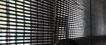 Woodweave roll-up and folding blinds by Zonnelux by Piet Boon