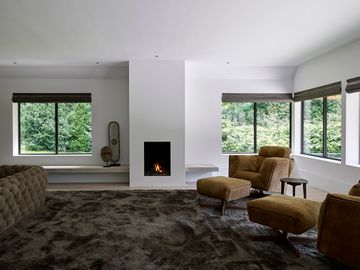 HEIT swivel chair & ottoman by Piet Boon - view 4